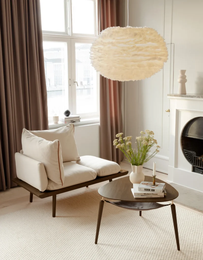 UMAGE "Lounge Around" sofa,
"Eos" pendant lamp